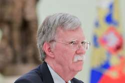 Джон Болтон під час візиту у Москву