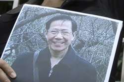 В Китае правозащитника Циня Юнминя приговорили к 13 годам тюрьмы