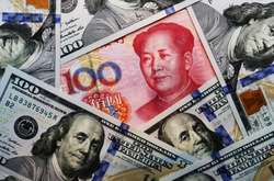 Курс национальной валюты Китая продемонстрировал рекордное падение к доллару