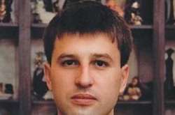 Київський прокурор, підозрюваний в отриманні $150 тис хабаря, через суд повернув посаду 