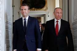 Макрон поговорить з Путіним про Сенцова - Reuters