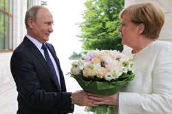 Путин собирается в Германию на встречу с Меркель