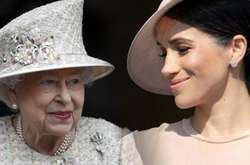 Королева Елизавета и Меган Маркл