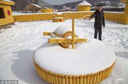 Китайский дом из тысяч кукурузных початков (фото)