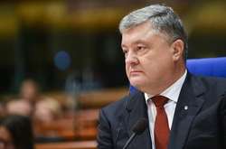 Порошенко заявив, що окупація Криму має стати непосильним тягарем для РФ
