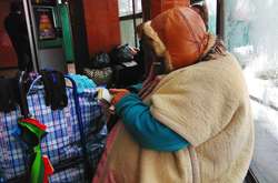 Жебрачка перебралася в метро