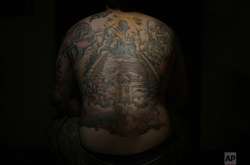 Іракці роблять татуювання, щоб приховати шрами війни. Фотогалерея