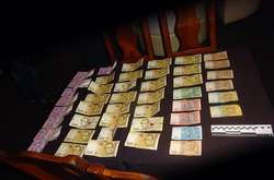 Правопорушники відібрали у відвідувача кафе гаманець із грошима