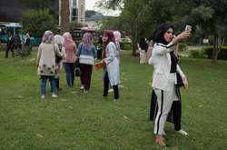 Селфи и развлечения на ярмарках: в Багдад возвращается нормальная жизнь