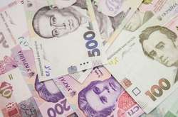 Нацбанк зміцнив офіційний курс гривні щодо долара
