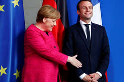 Ангела Меркель та Еммануель Макрон