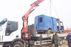 Покинуті автівки, незаконні кіоски і гаражі: Київ очищають від непотребу (фото)