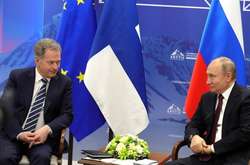  Саулі Нііністьо і Володимир Путін 