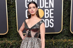 Завязавшая с алкоголем Энн Хэтэуэй примерила роковой образ для модного глянца