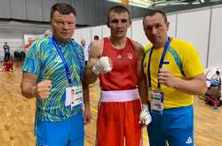 Олександр Хижняк з наставником збірної України Леонідом Лоївським (зліва) і своїм батьком та особистим тренером Олександром Хижняком-старшим