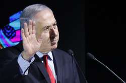 Выборы в Израиле: Нетаньяху выглядит, как добрый дедушка, а не чиновник с плаката