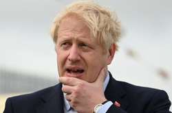 Прем'єр Британії заперечив незаконні зв'язки з американською підприємницею