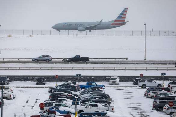 Из-за снега в США отменены более 900 авиарейсов