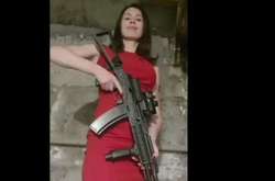 Татьяна Черновол с автоматом в руках призвала украинцев выходить на Майдан (видео)