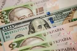 Нацбанк підвищив курс долара на середу 