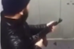 Побиття бородатого чоловіка закінчилося стріляниною з автомата (відео)