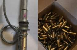 У Києві у викрадача автівки слідчі виявили арсенал зброї та боєприпасів (фото, відео)