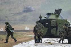 Бойовики на Донбасі зганяють танки та артилерію