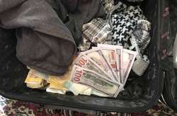 Під Києвом троє в масках пограбували пункт обміну валют (фото)