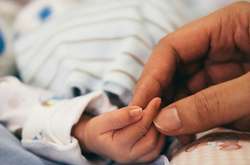 На Київщині хвора на коронавірус народила дитину