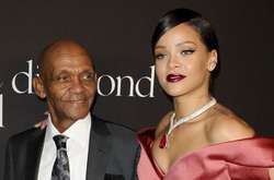 Поп-певица Рианна с отцом