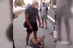 Ексберкутівцю повідомили про підозру через побиття активіста за українську символіку