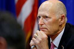 Рік Скотт входить до складу комітетів американського Сенату з питань збройних сил і національної безпеки США