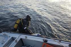 Із Дніпра на Оболоні водолази дістали тіло чоловіка (фото)