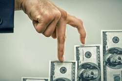 Нацбанк підвищив курс долара ще на 13 копійок 