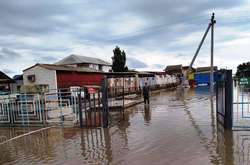 Рясні дощі підтопили селище Кирилівку у Запорізькій області