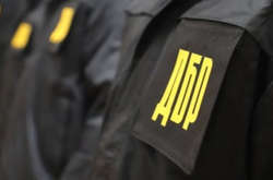 Майор СБУ и полковник в запасе работали на разведку РФ, пряча информацию в конфетах (фото)