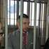 Віталій Марків спілкується з адвокатами перед судовим засіданням у Павії