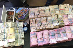 В Киеве нашли конвертцентр, прикрывавшийся «инвалидностью»: изъяли 36 миллионов