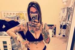 Фанатка Эминема установила рекорд по количеству татуировок с портретом одного музыканта