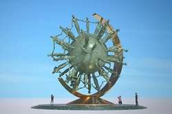 Монумент являє собою молекулу коронавірусу з шипами — у вигляді планети Земля