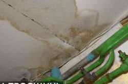 На столичній Троєщині затопило квартири після дощу (фото, відео) 