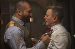 Актер Дэниэл Крэйг и рестлер Дэйв Батиста