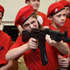 Дітей в окупованому Криму з молодших класів виховують із військовим ухилом і навчають поводитися з важким озброєнням