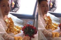 В Китае девушка надела на свадьбу 60 килограммов золота и не смогла ходить
