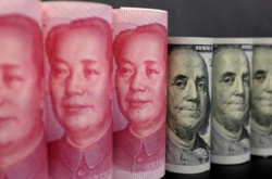 Валюта КНР у році, що минає, укріпилась на 8%. Стосовно долара юань здорожчав на 2,6%