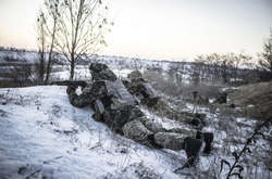 Майже половина українців у разі російського вторгнення РФ або підуть воювати, або надаватимуть підтримку армії