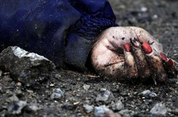 Фото, которое облетело весь мир. История женщины, которую рашисты убили на Киевщине