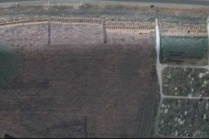 Супутник зафіксував 300-метрову братську могилу під Маріуполем (фото)