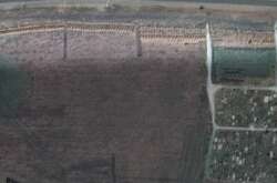 Братська могила в Мангуші, знімок від 9 квітня