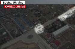 Дрон зафіксував російських військових поруч із тілами розстріляних у Бучі людей